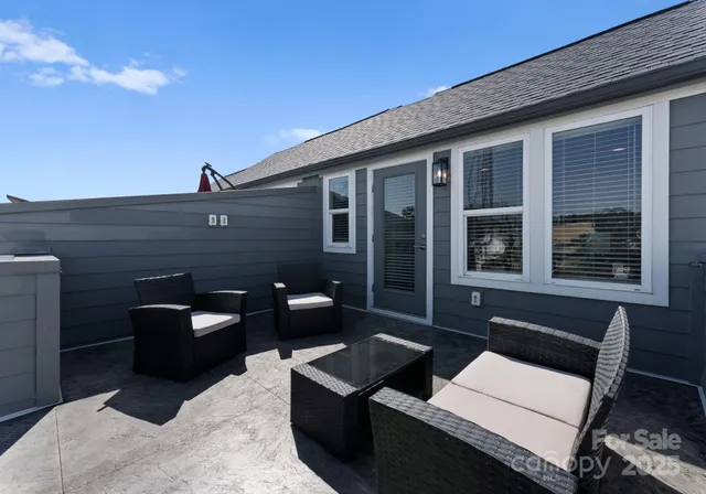 a outdoor living space with patio furniture