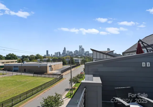 a view of a balcony with city view