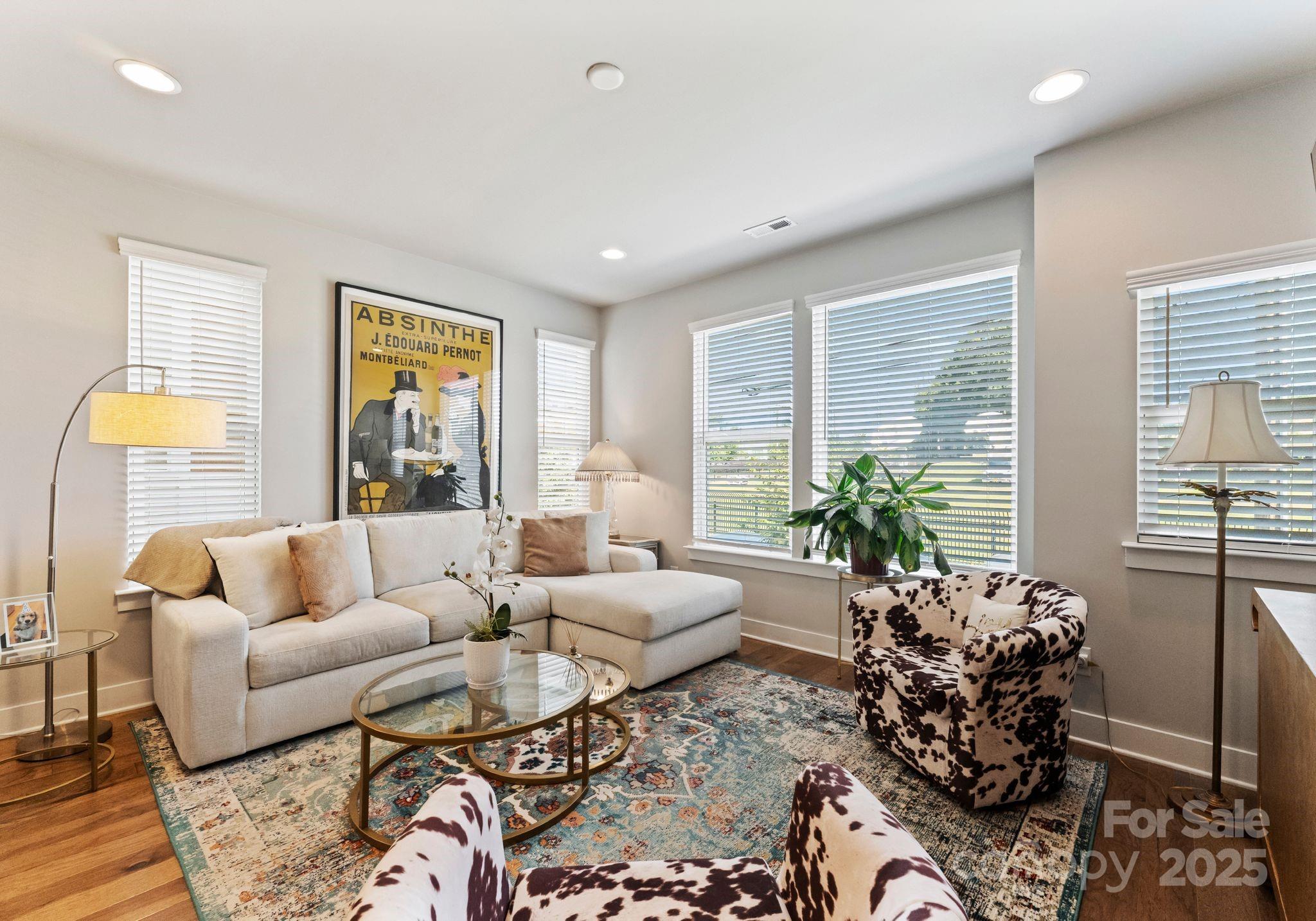 2111 Isom Street Charlotte, NC 28208 - Photo 6 of 36 a living room with furniture and a large window