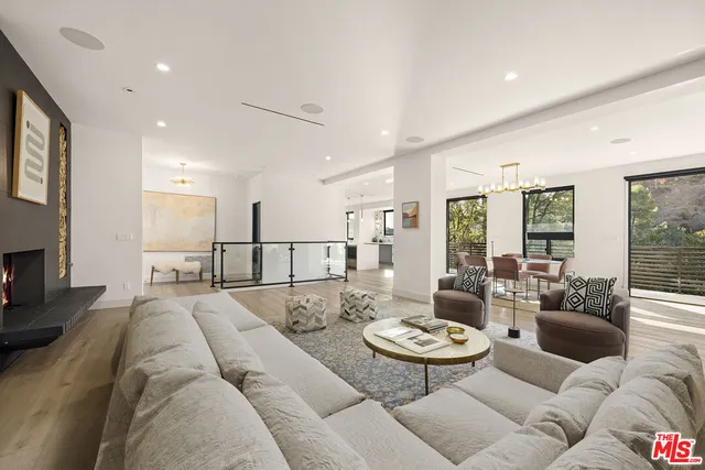 a living room with furniture and a table