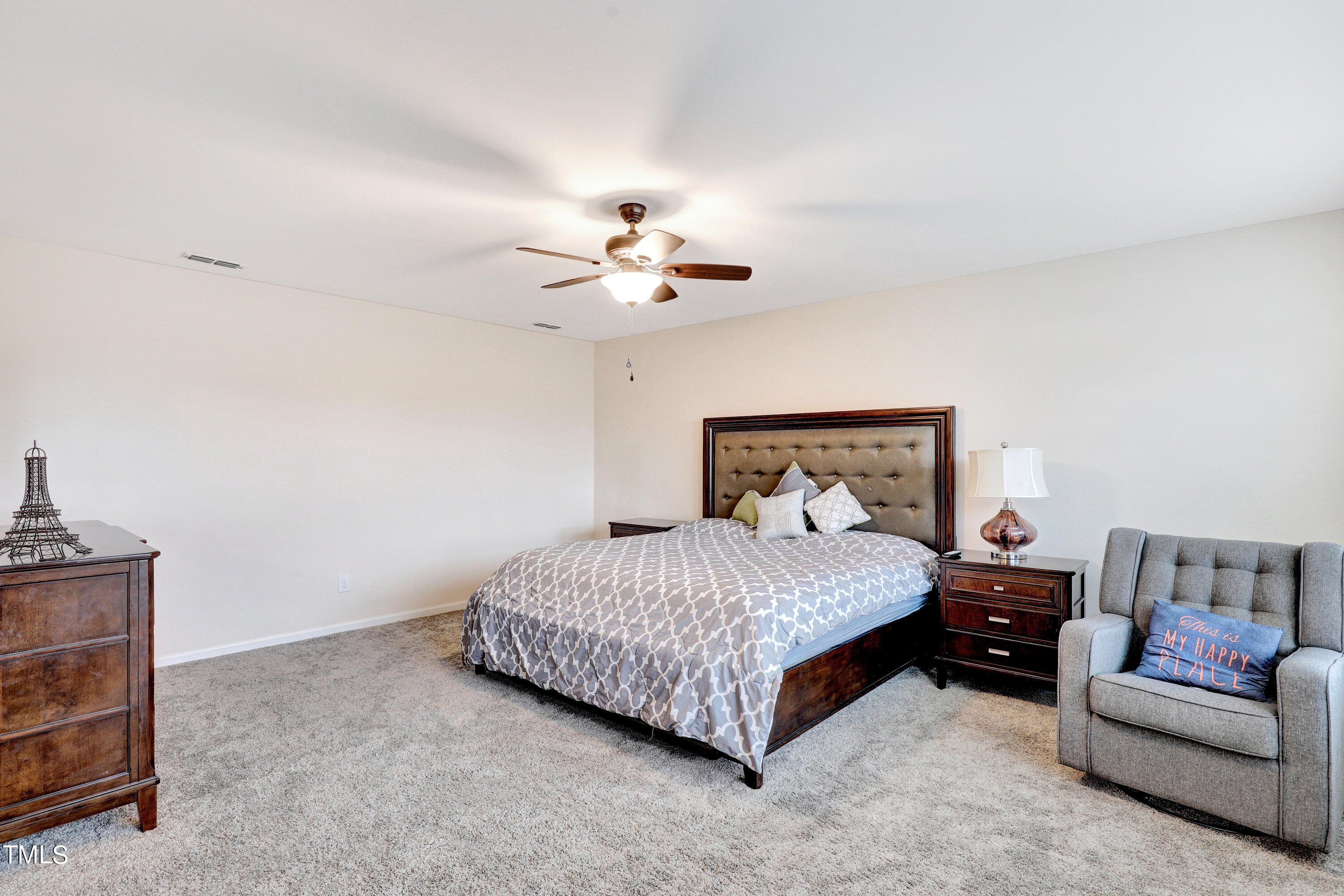 329 Hope Valley Road Knightdale, NC 27545 - Photo 20 of 34 a bedroom with a bed and a couch