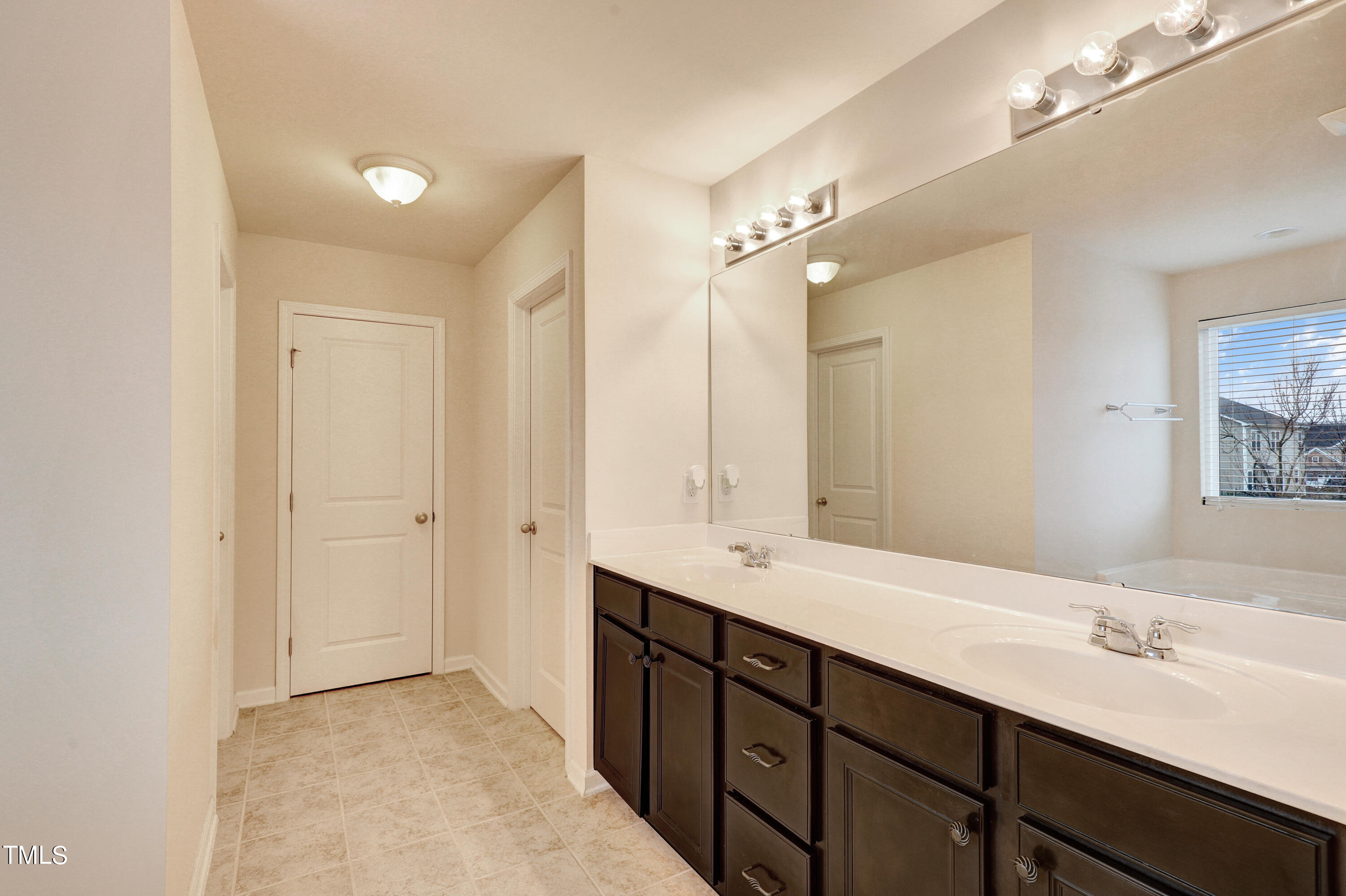 329 Hope Valley Road Knightdale, NC 27545 - Photo 22 of 34 a bathroom with a double vanity sink mirror and double
