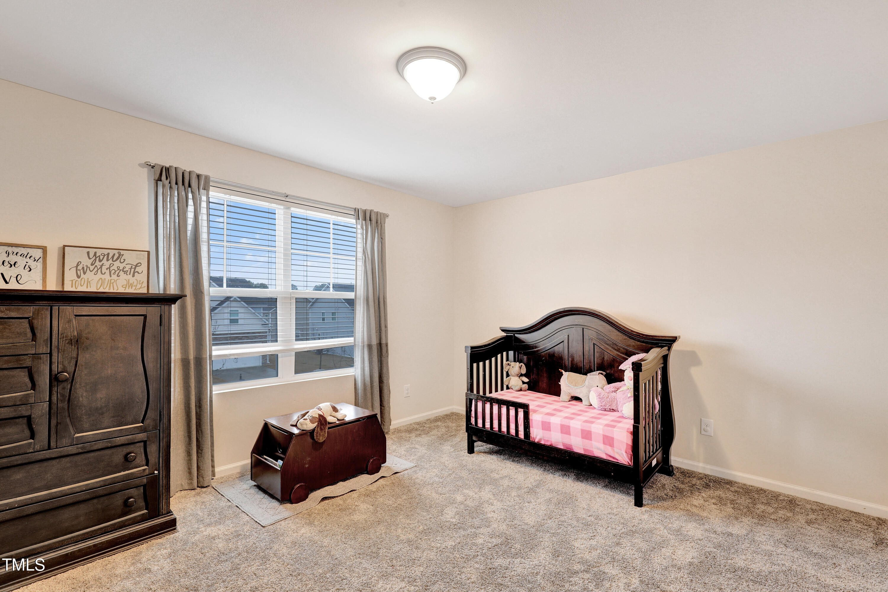 329 Hope Valley Road Knightdale, NC 27545 - Photo 25 of 34 a bedroom with furniture and a window