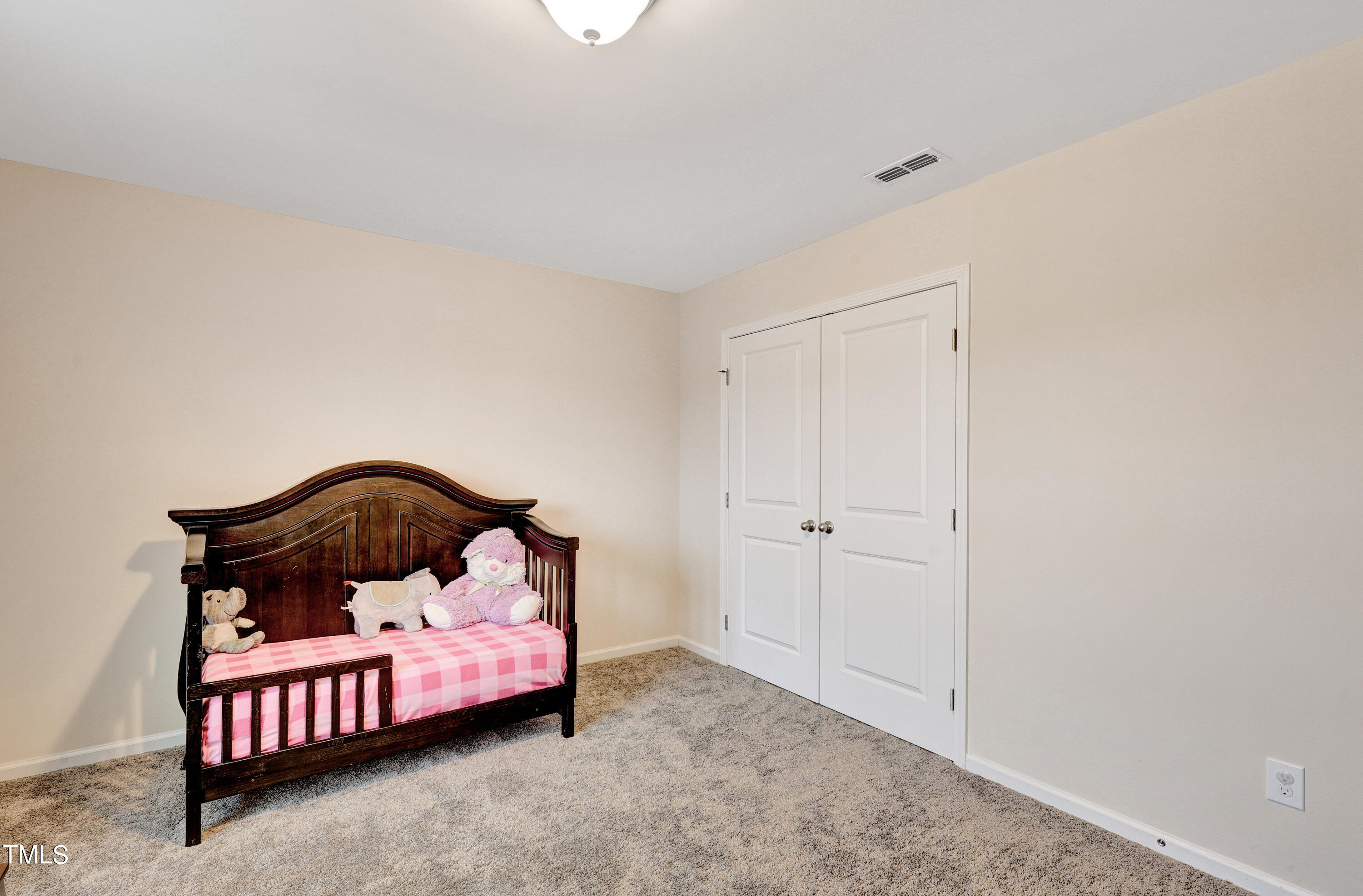 329 Hope Valley Road Knightdale, NC 27545 - Photo 26 of 34 a bedroom with a bed and a window