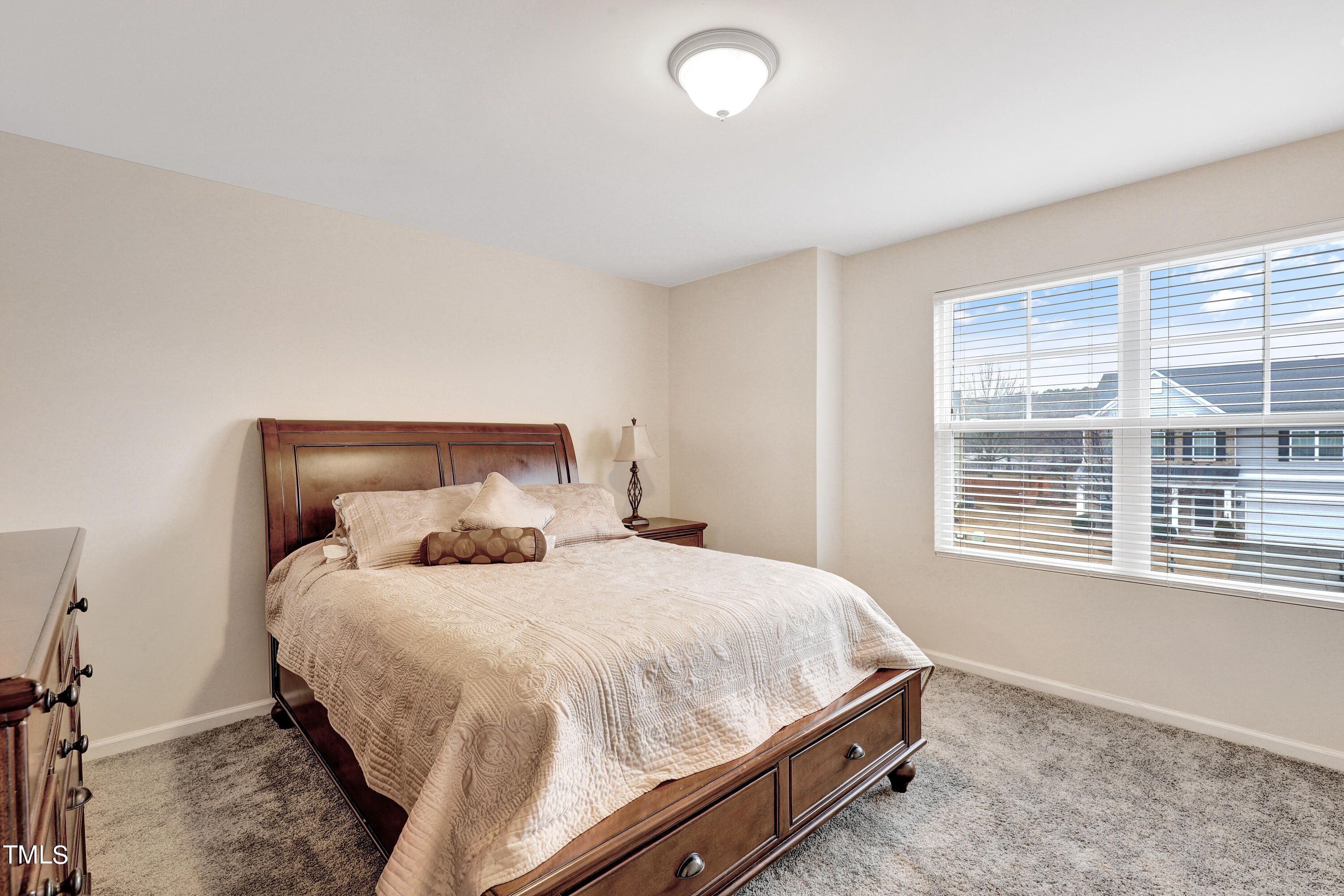 329 Hope Valley Road Knightdale, NC 27545 - Photo 27 of 34 a bedroom with a bed and a window