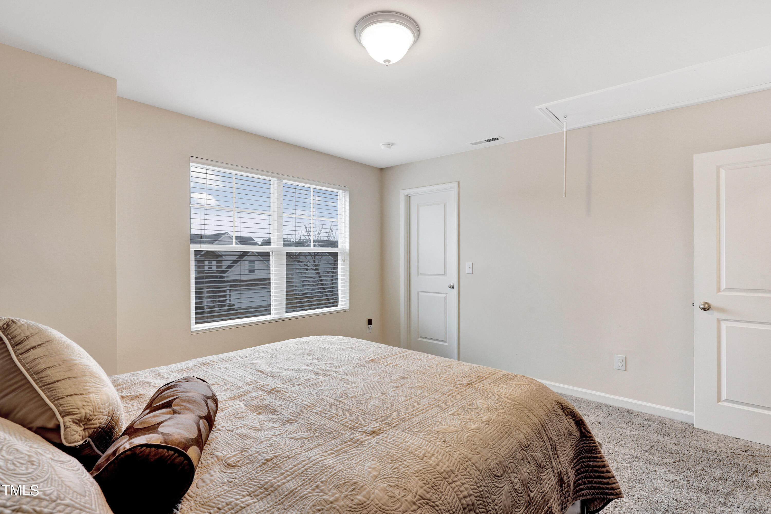 329 Hope Valley Road Knightdale, NC 27545 - Photo 28 of 34 a bedroom with a bed and a large window