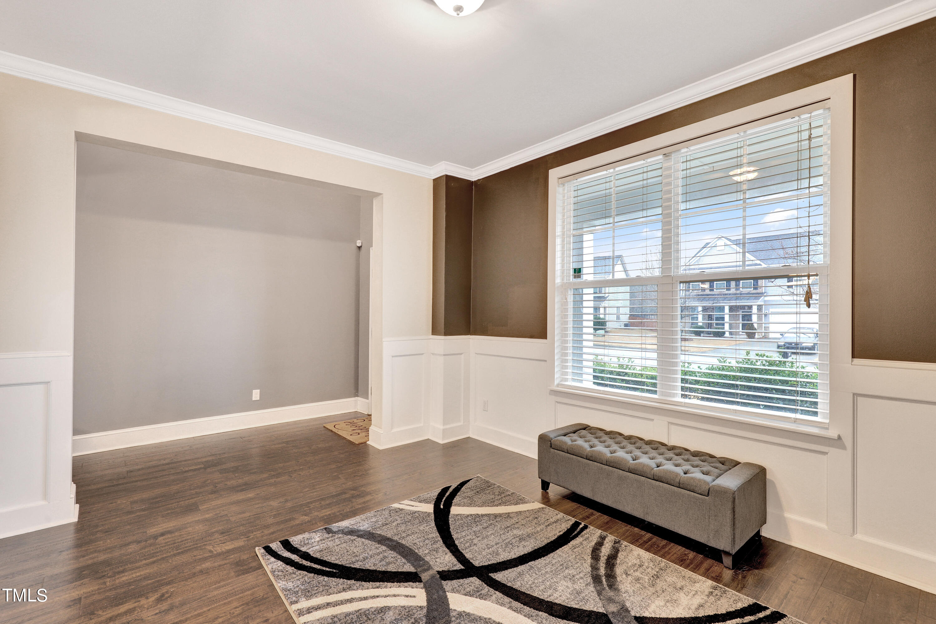 329 Hope Valley Road Knightdale, NC 27545 - Photo 3 of 34 a living room with furniture and a window with wooden floor