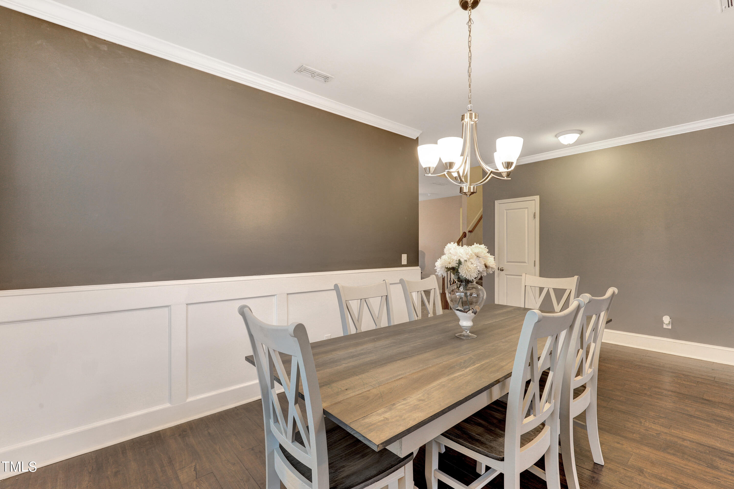 329 Hope Valley Road Knightdale, NC 27545 - Photo 6 of 34 a view of a dining room with furniture and wooden floor