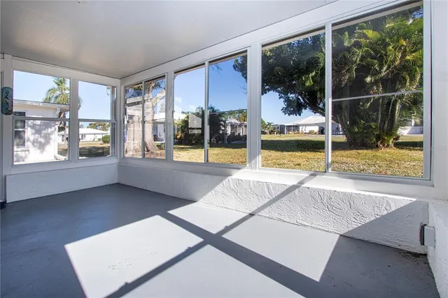 a view of a dining area with furniture window and wooden floor