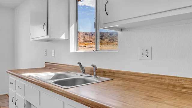 a view of an empty room and window