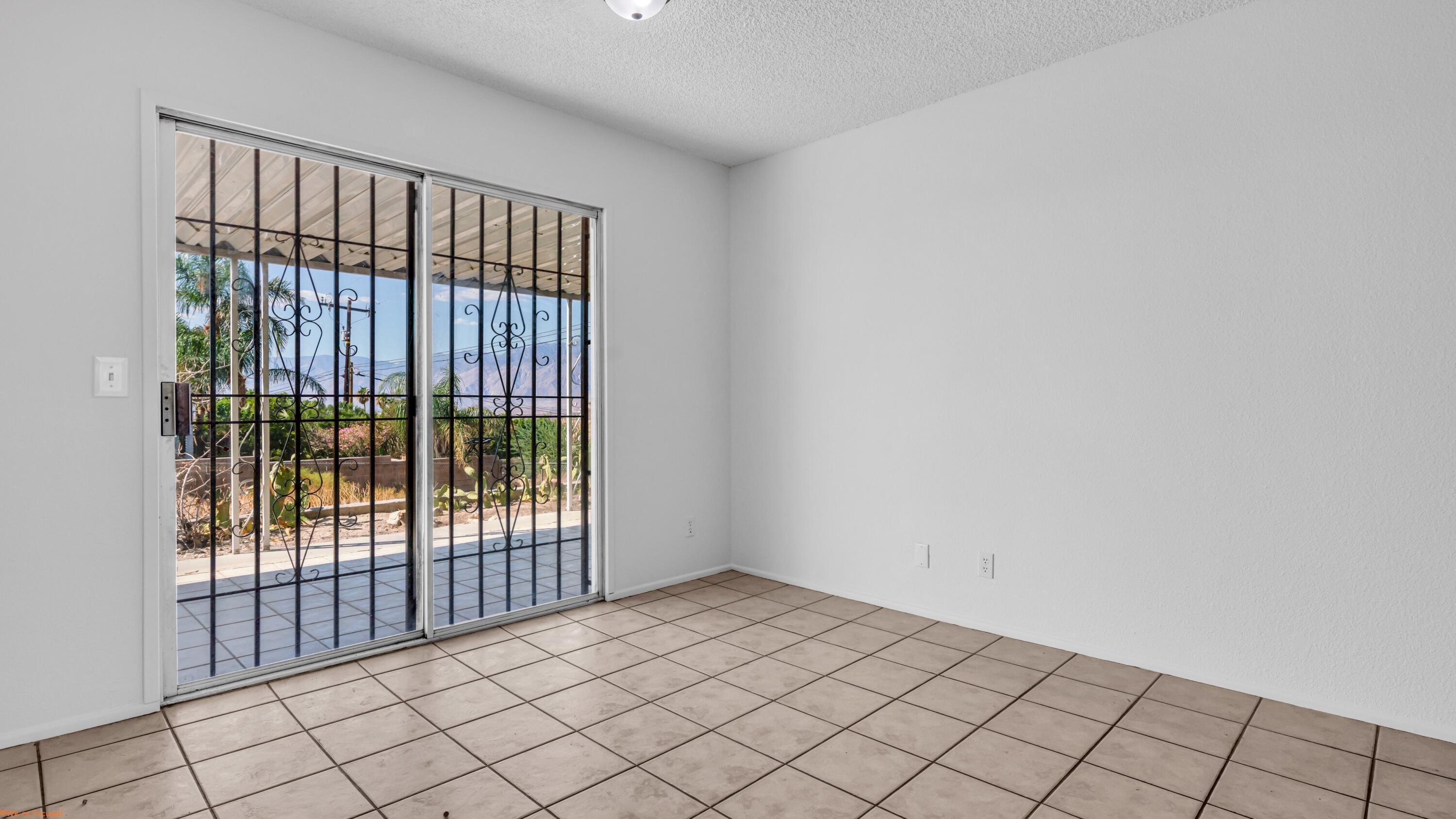 67285 Pierson Boulevard, Unit B Desert Hot Springs, CA 92240 - Photo 21 of 29 a view of an empty room and window