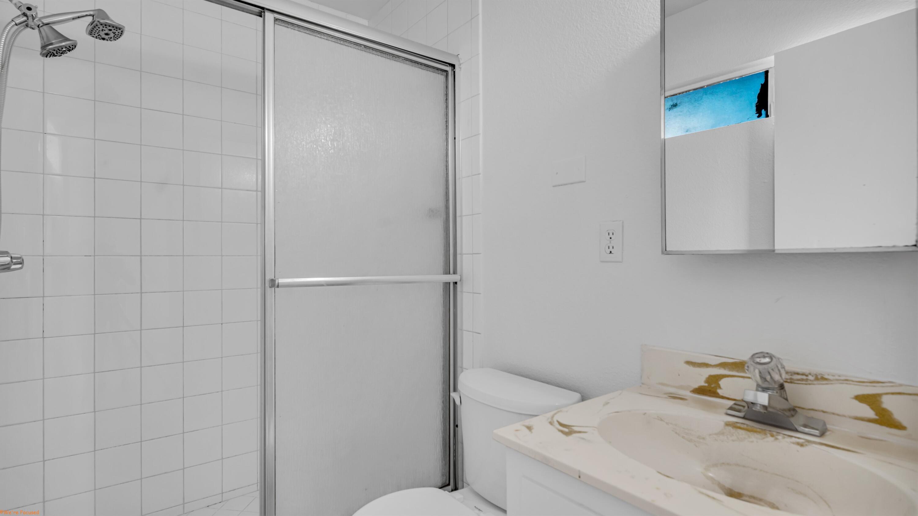 67285 Pierson Boulevard, Unit B Desert Hot Springs, CA 92240 - Photo 28 of 29 a bathroom with a sink toilet and shower
