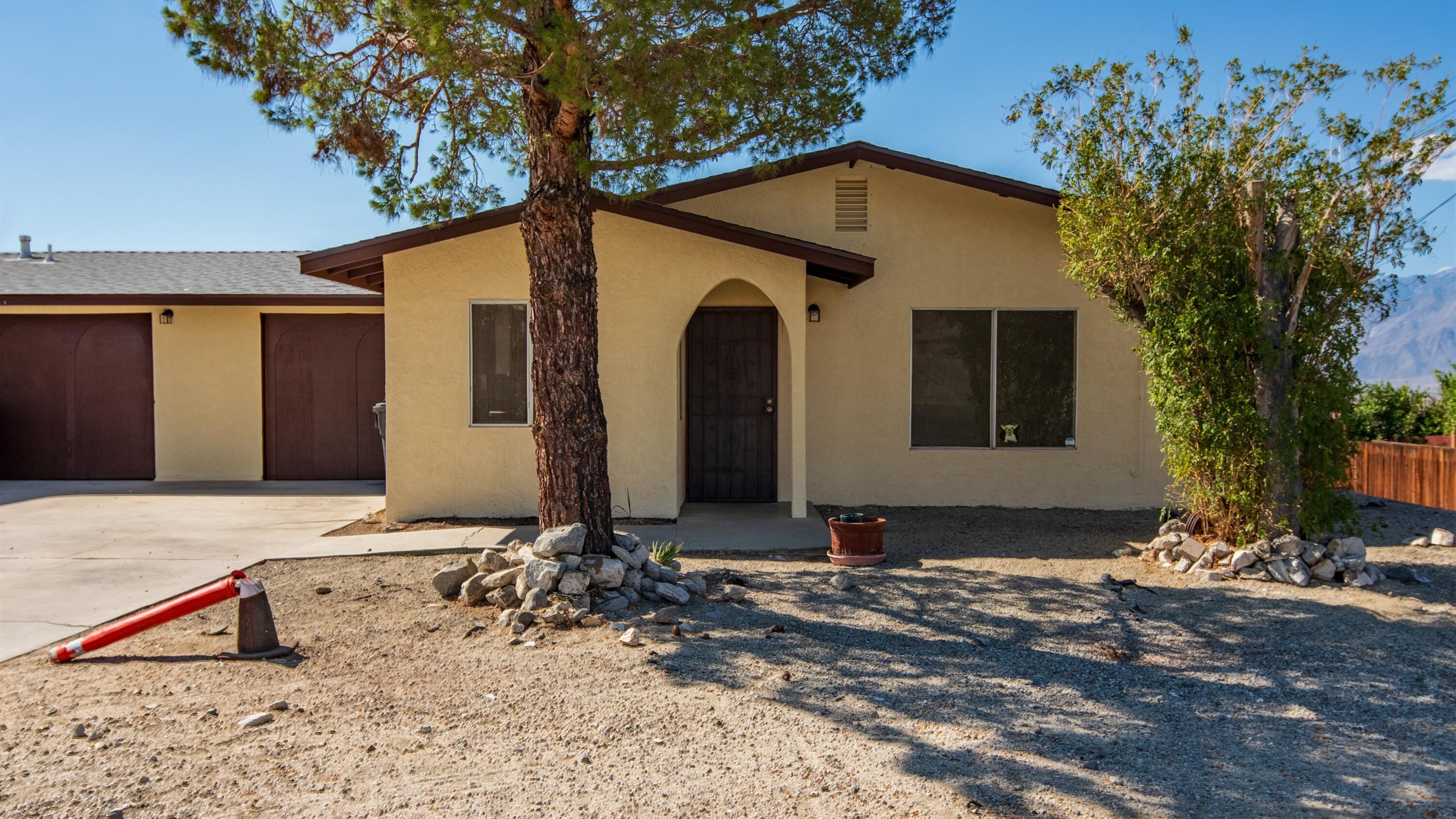 67285 Pierson Boulevard, Unit B Desert Hot Springs, CA 92240 - Photo 3 of 29 a front view of a house