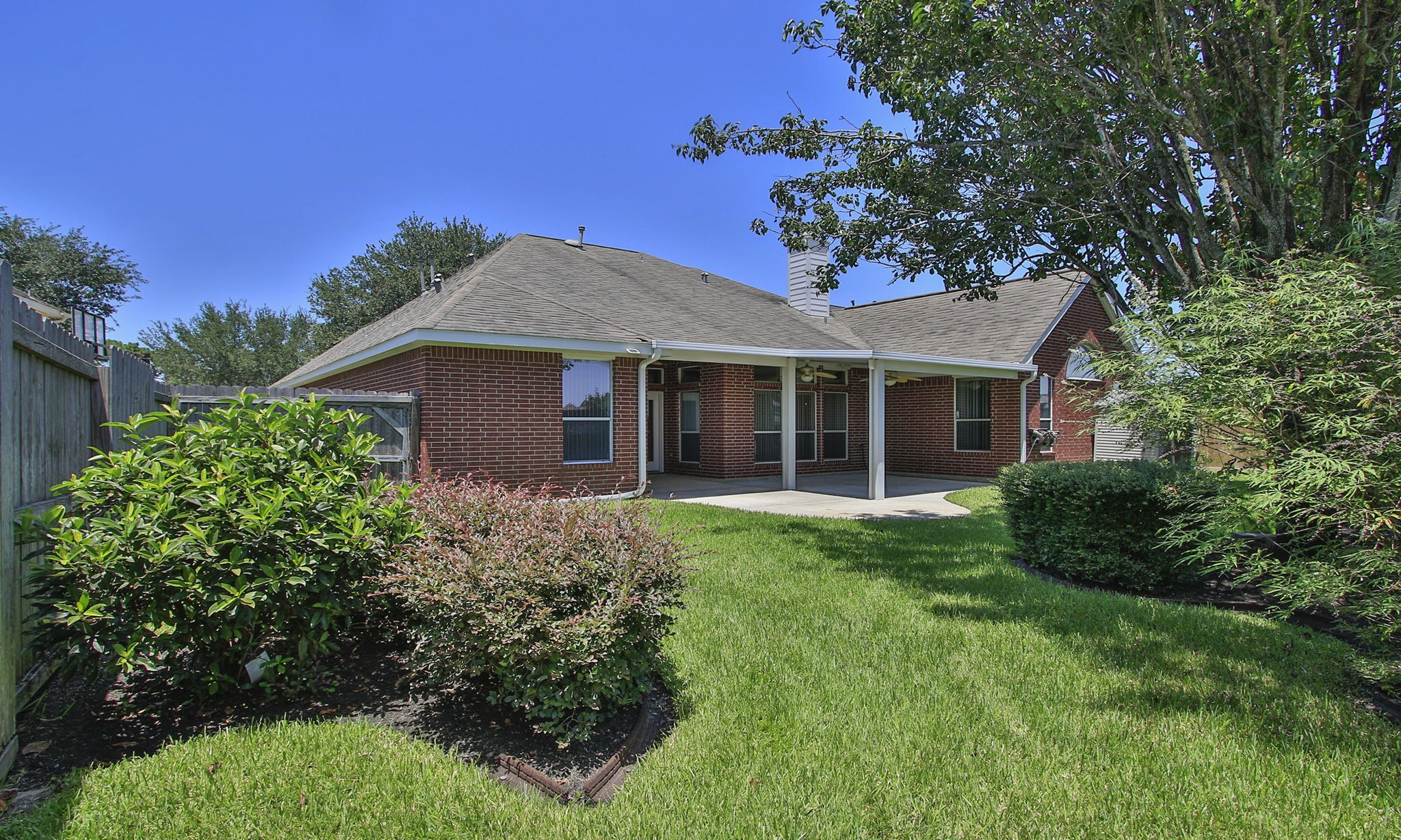 6311 Stone Trail Lane Spring, TX 77379 - Photo 35 of 47 Put your phone on silent, make a drink, and enjoy the peaceful backyard!