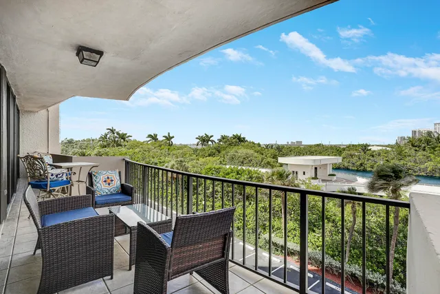 a view of a balcony with city view