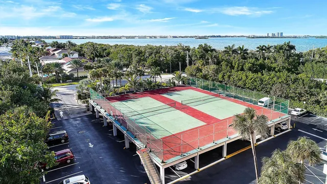 a aerial view of a balcony with chairs