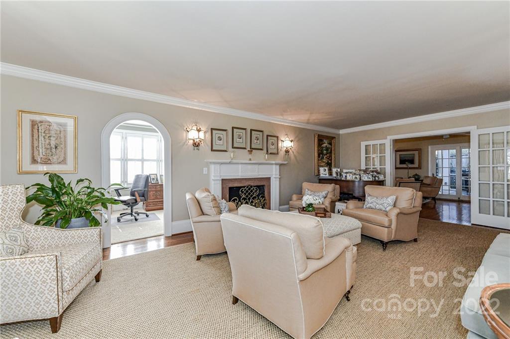 2700 Normandy Road Charlotte, NC 28209 - Photo 11 of 42 a living room with furniture and a fireplace