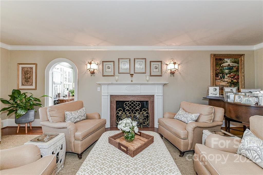 2700 Normandy Road Charlotte, NC 28209 - Photo 12 of 42 a living room with furniture and a fireplace