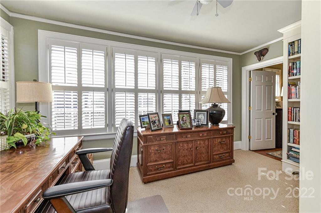 2700 Normandy Road Charlotte, NC 28209 - Photo 13 of 42 a living room with furniture and large windows