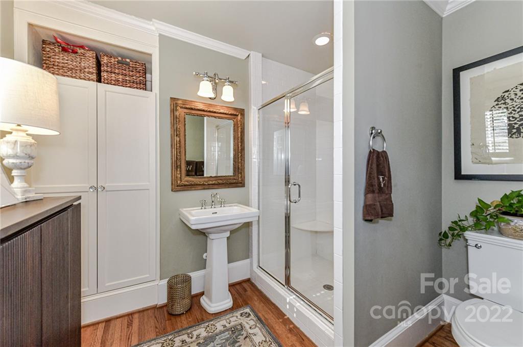 2700 Normandy Road Charlotte, NC 28209 - Photo 15 of 42 a bathroom with a sink toilet and shower