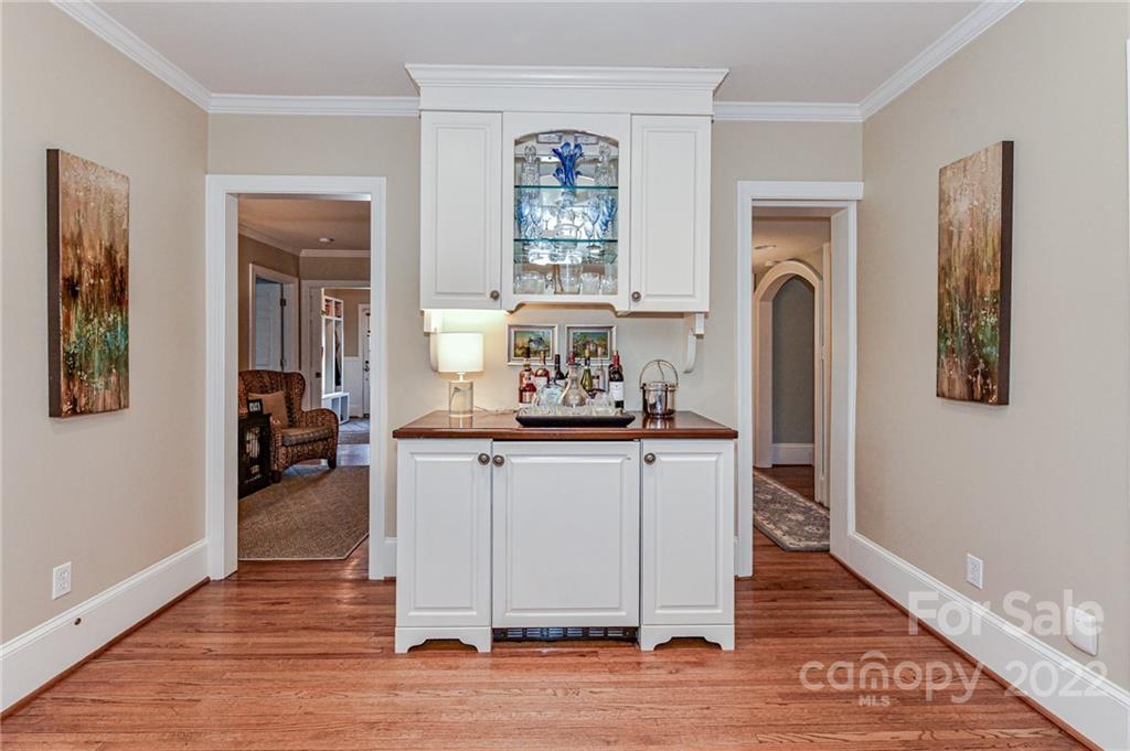 2700 Normandy Road Charlotte, NC 28209 - Photo 18 of 42 a living room with granite countertop furniture and a fireplace