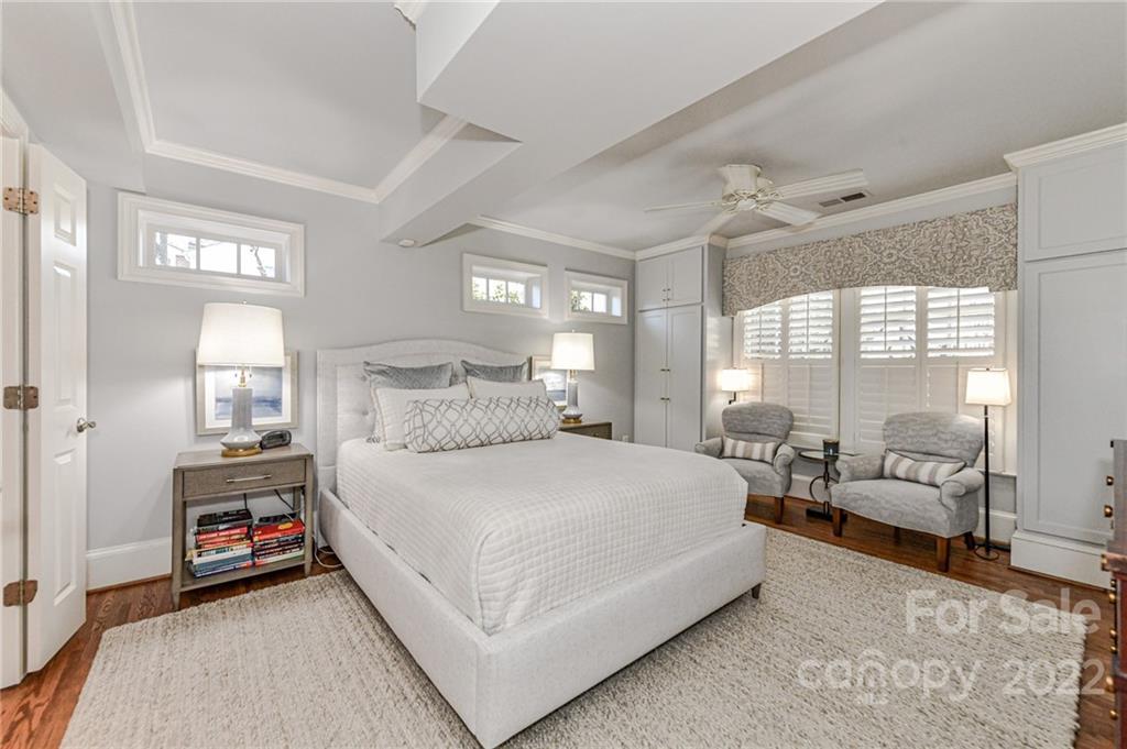 2700 Normandy Road Charlotte, NC 28209 - Photo 23 of 42 a bedroom with a bed and large window