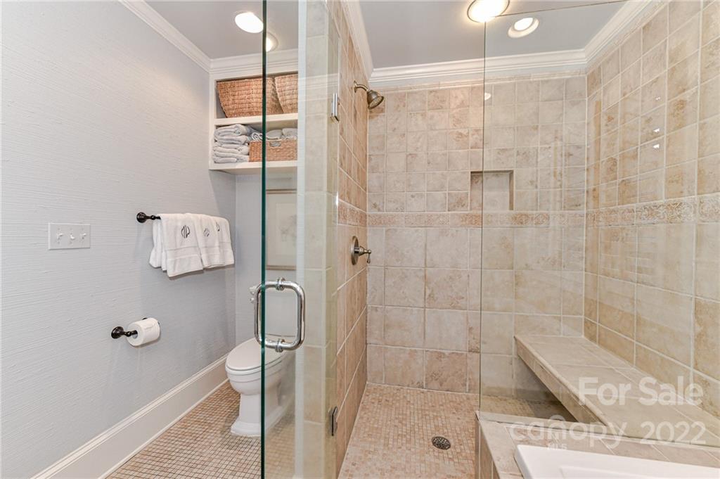 2700 Normandy Road Charlotte, NC 28209 - Photo 25 of 42 a bathroom with a shower