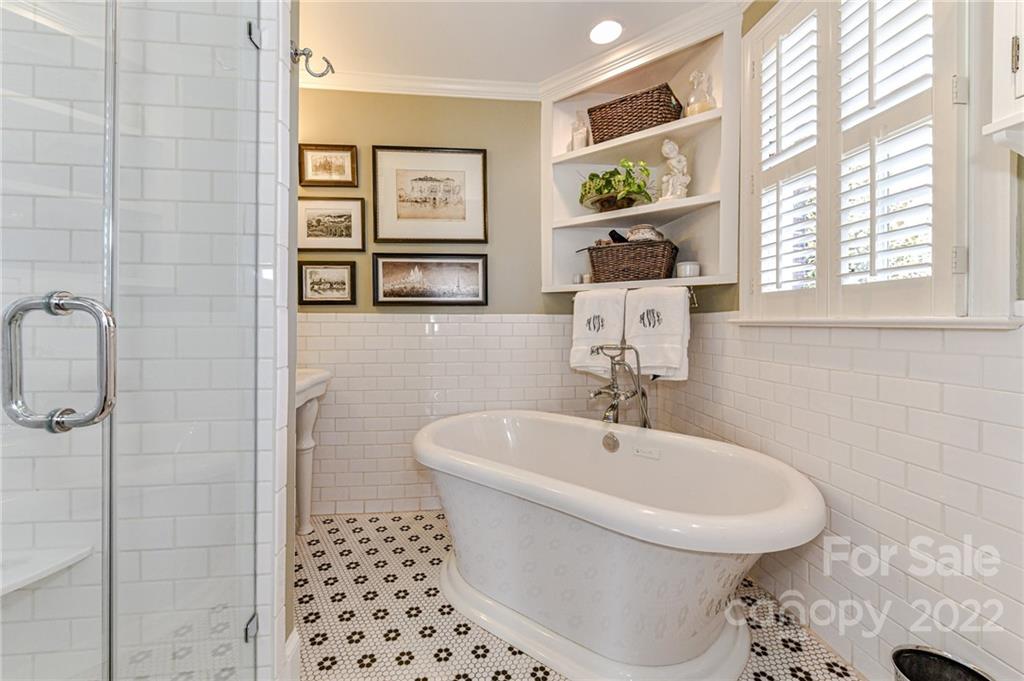 2700 Normandy Road Charlotte, NC 28209 - Photo 30 of 42 a bathroom with a sink and a mirror