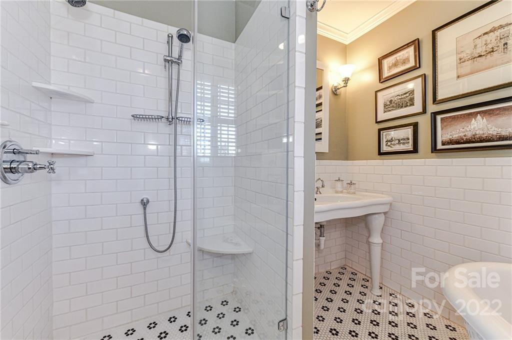 2700 Normandy Road Charlotte, NC 28209 - Photo 32 of 42 a bathroom with a shower