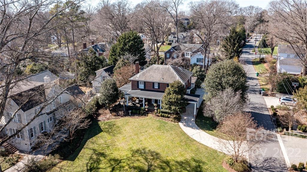 2700 Normandy Road Charlotte, NC 28209 - Photo 42 of 42 a view of a swimming pool with a yard and sitting area
