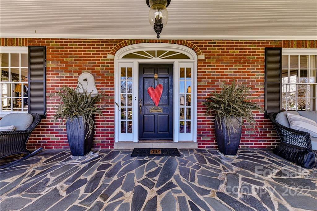 2700 Normandy Road Charlotte, NC 28209 - Photo 6 of 42 a front view of a house with entryway
