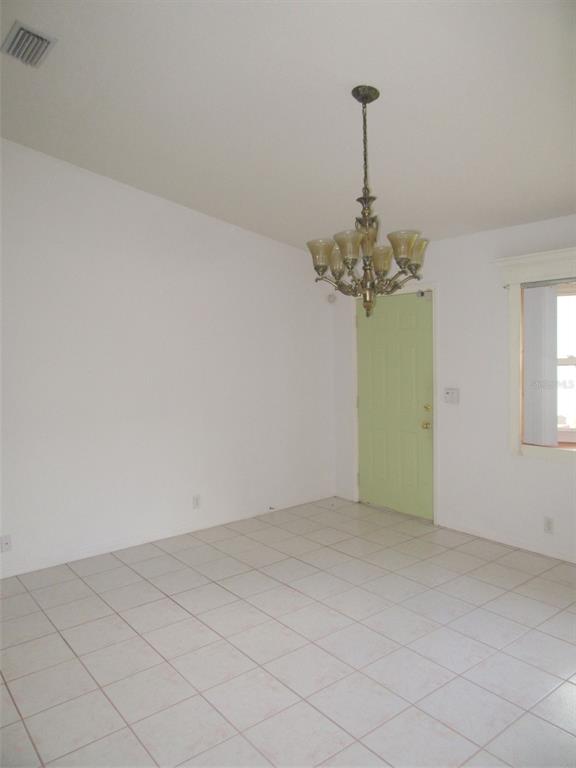 3632 Annapolis Terrace North Port, FL 34287 - Photo 2 of 14 a view of a room with window and chandelier