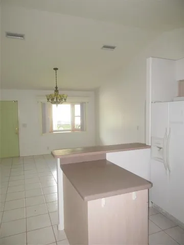 a view of an empty room with window