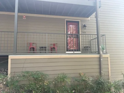 a bathroom with a bathtub and shower