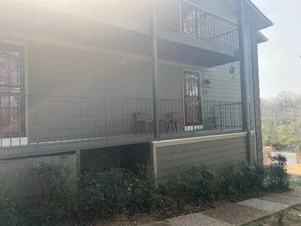 a bathroom with a sink and a shower