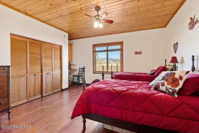 a bathroom with a double vanity sink and mirror