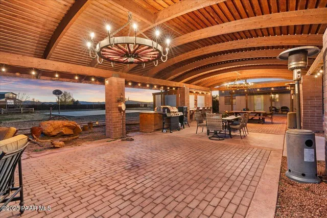 a bathroom with a sink a mirror and a shower curtain