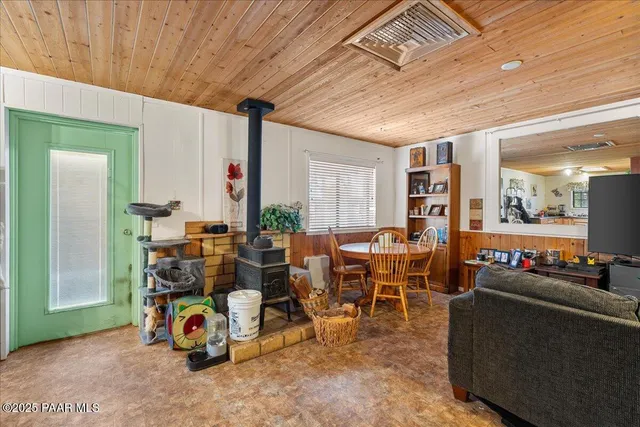 a view of a swimming pool with lounge chairs