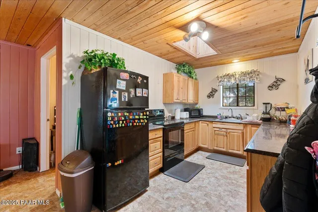 a view of a lake with houses in the back