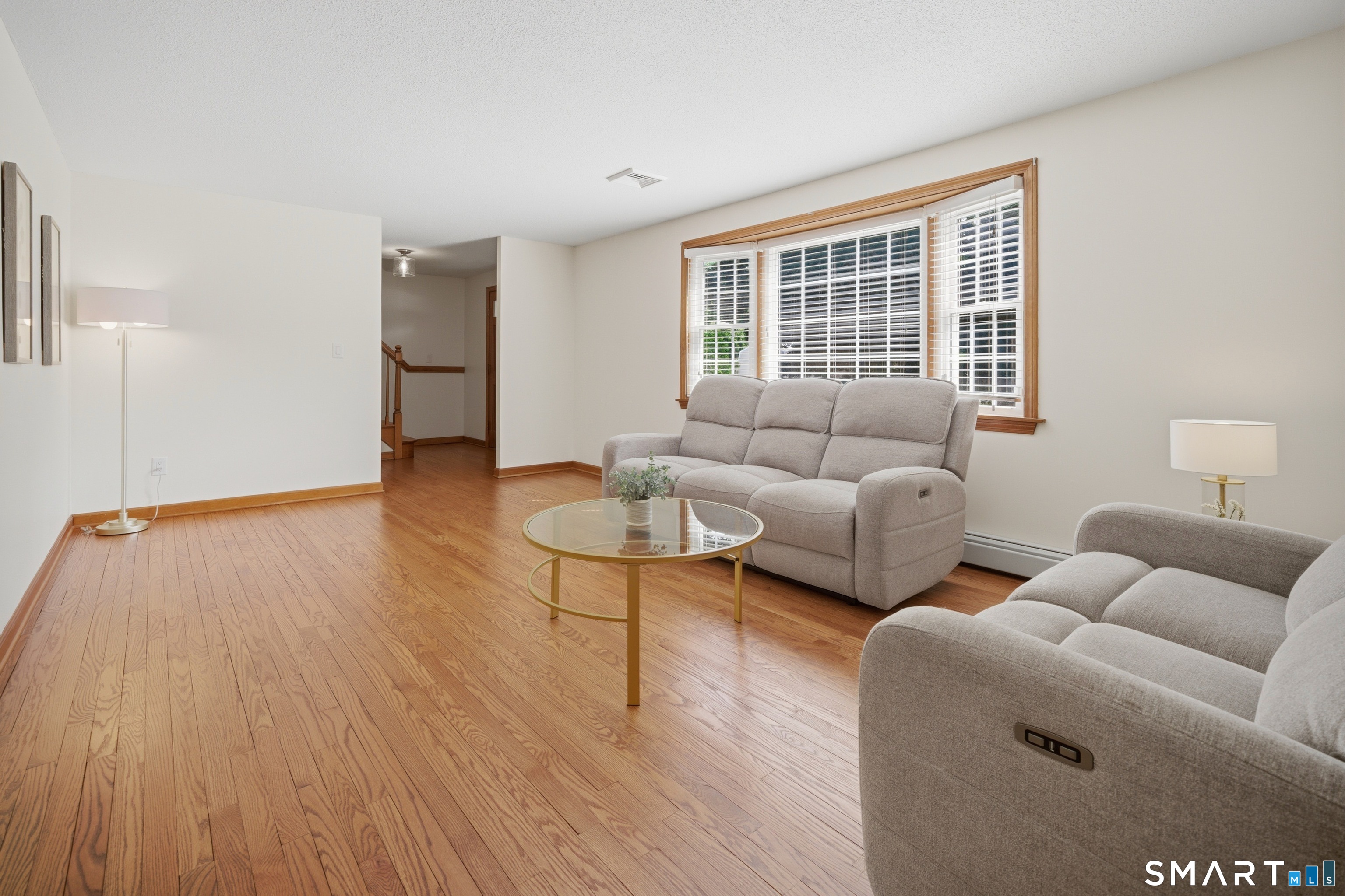 211 Valley View Road Manchester, CT 06040 - Photo 7 of 39 a living room with furniture and a window