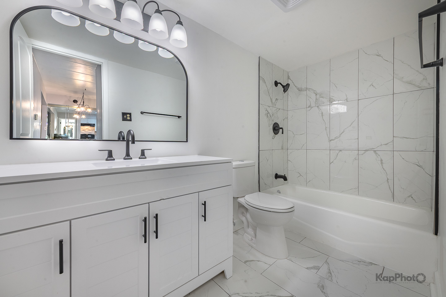 669 Chappel Avenue, Unit 1A Calumet City, IL 60409 - Photo 19 of 24 a bathroom with a sink a toilet and shower