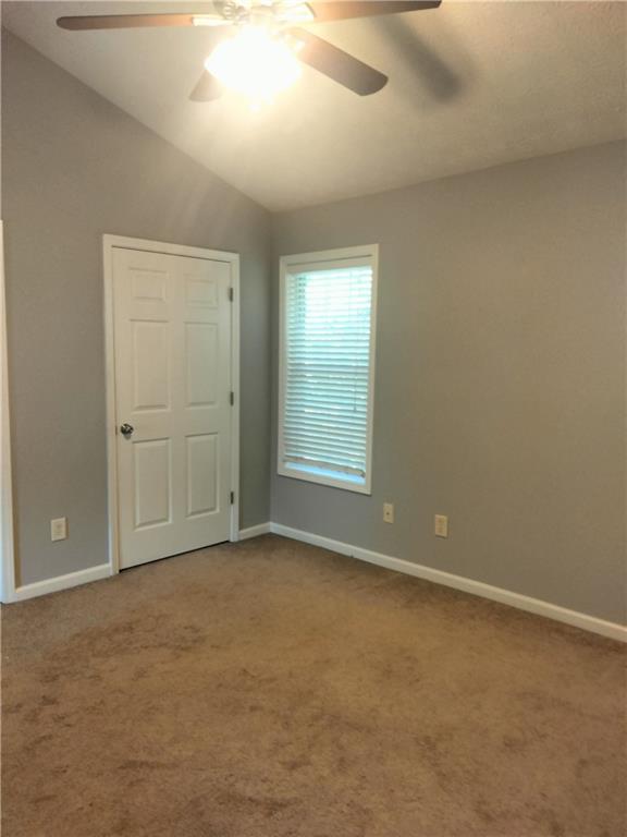 3299 Hampton Green Way Atlanta, GA 30340 - Photo 12 of 22 an empty room with windows and closet