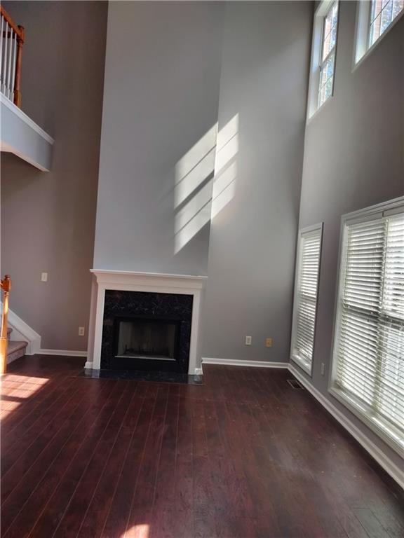 3299 Hampton Green Way Atlanta, GA 30340 - Photo 2 of 22 an empty room with windows and fireplace