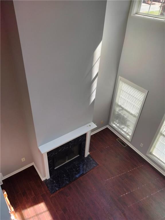 3299 Hampton Green Way Atlanta, GA 30340 - Photo 3 of 22 an empty room with wooden floor and windows