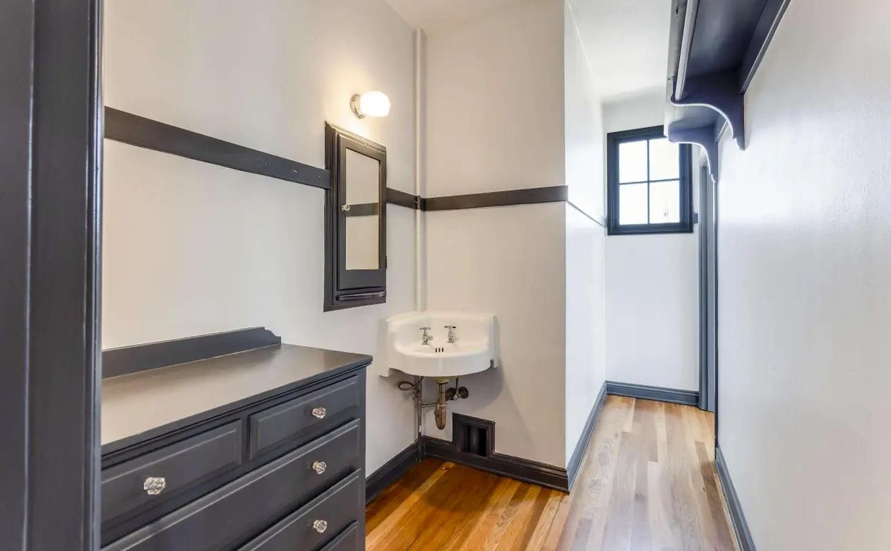 3719 Emerson Street Oakland, CA 94610 - Photo 17 of 34 a bathroom with a sink and a mirror