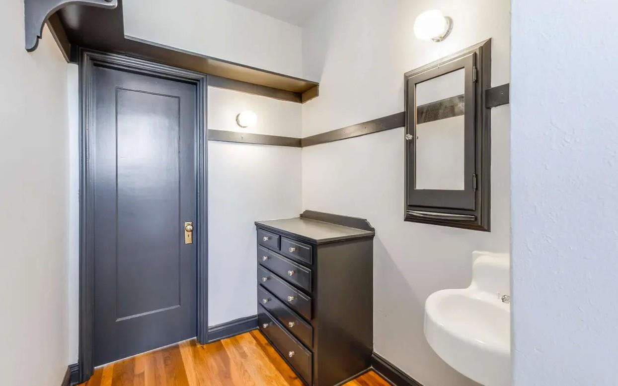 3719 Emerson Street Oakland, CA 94610 - Photo 18 of 34 a bathroom with a sink and a mirror