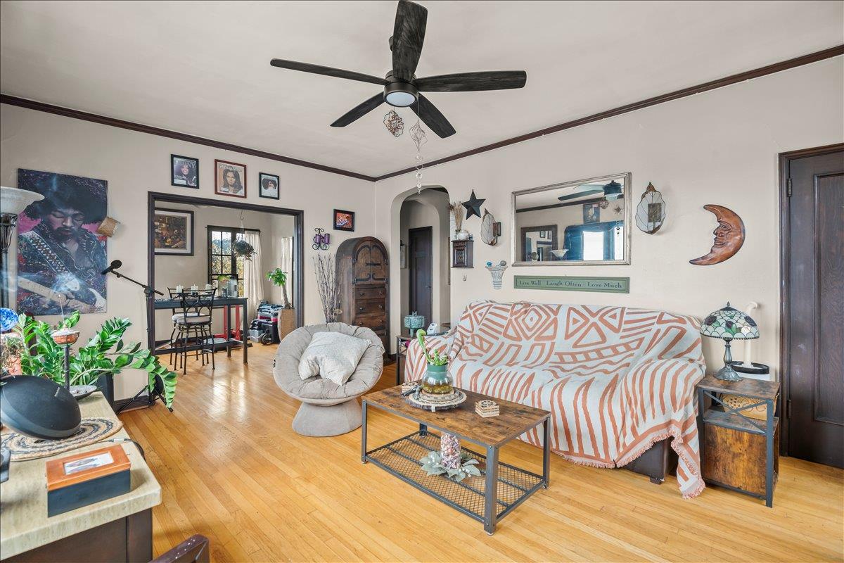 3719 Emerson Street Oakland, CA 94610 - Photo 25 of 34 a living room with furniture and a potted plant