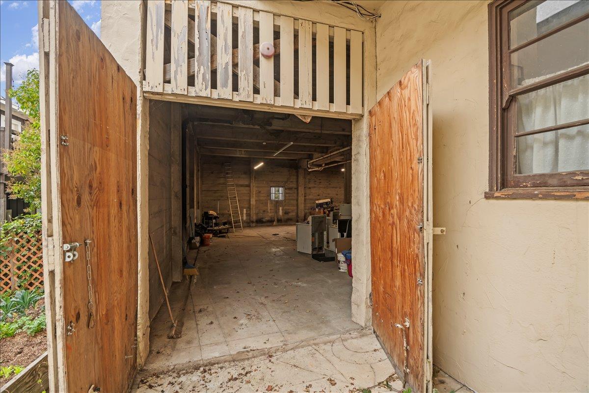 3719 Emerson Street Oakland, CA 94610 - Photo 6 of 34 a view of a porch with wooden floor and furniture