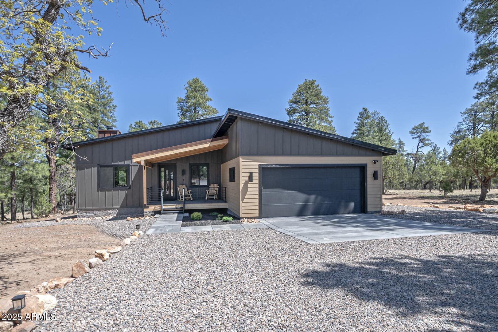 a house with trees in the background
