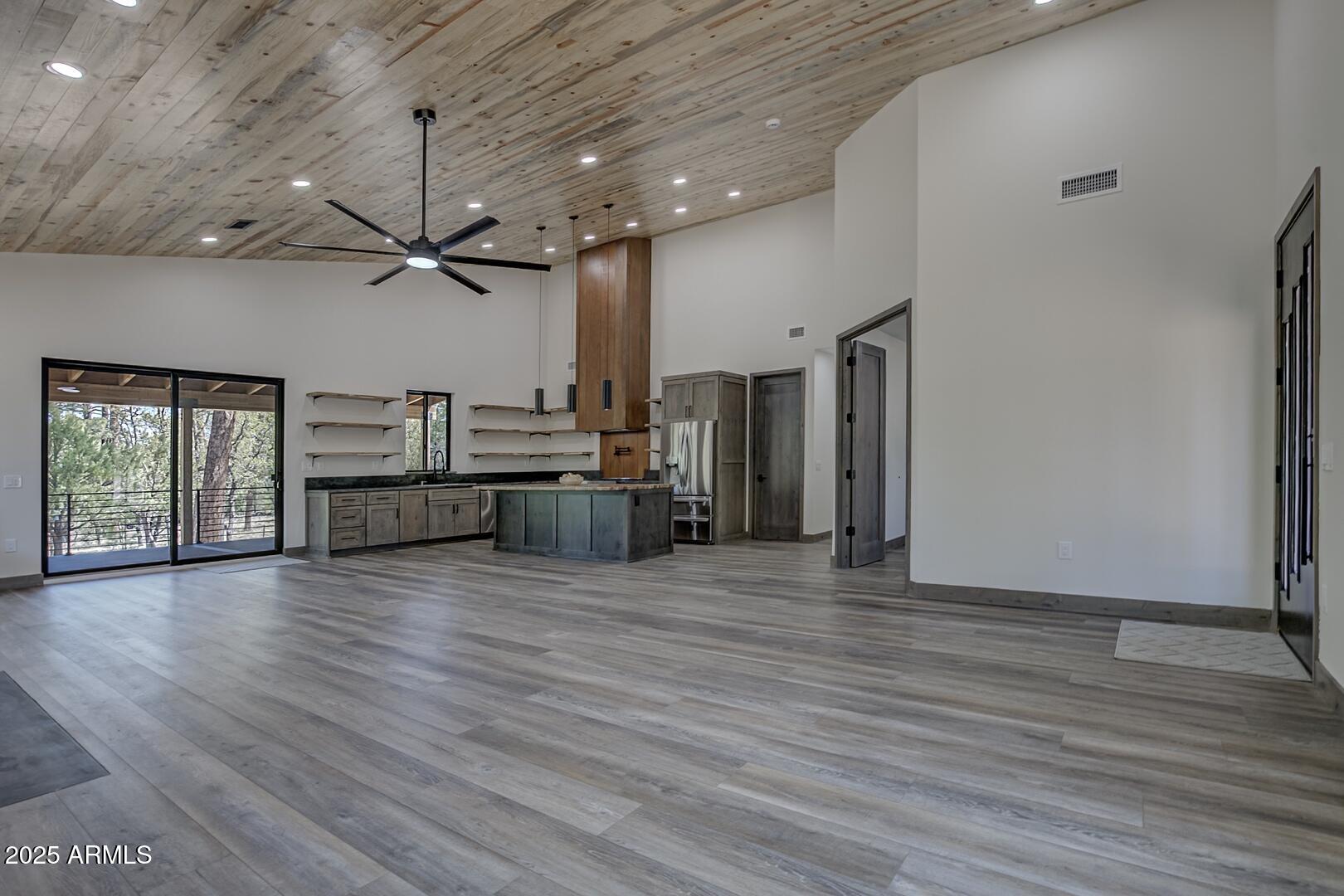 2965 Eagle Ridge Circle Happy Jack, AZ 86024 - Photo 15 of 54 a view of a livingroom with wooden floor